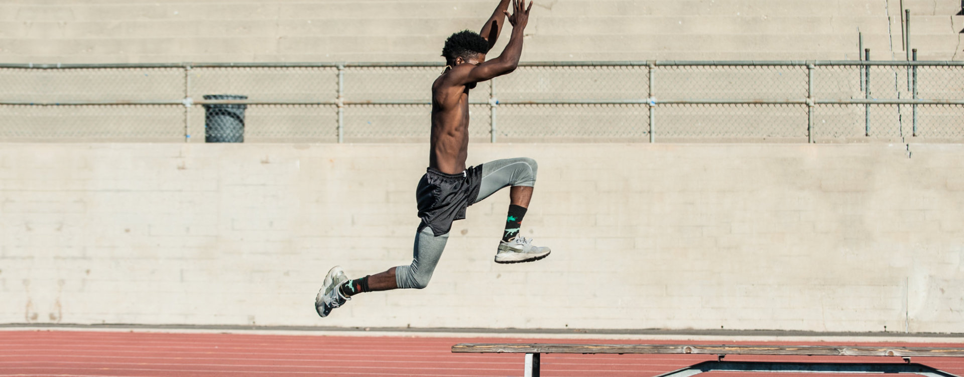 african man doing laps