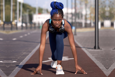 young woman athelete training for marathon